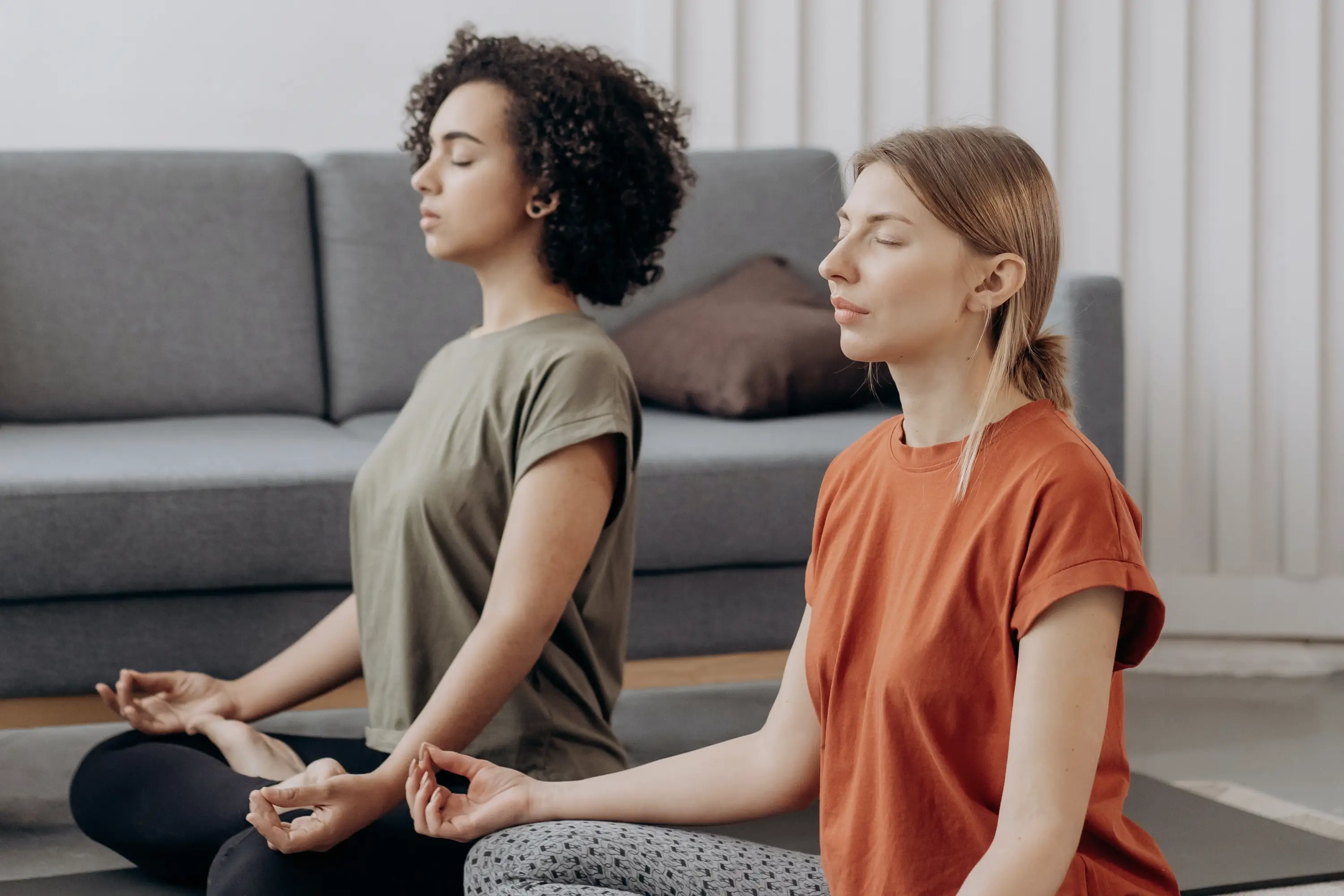 two people meditating